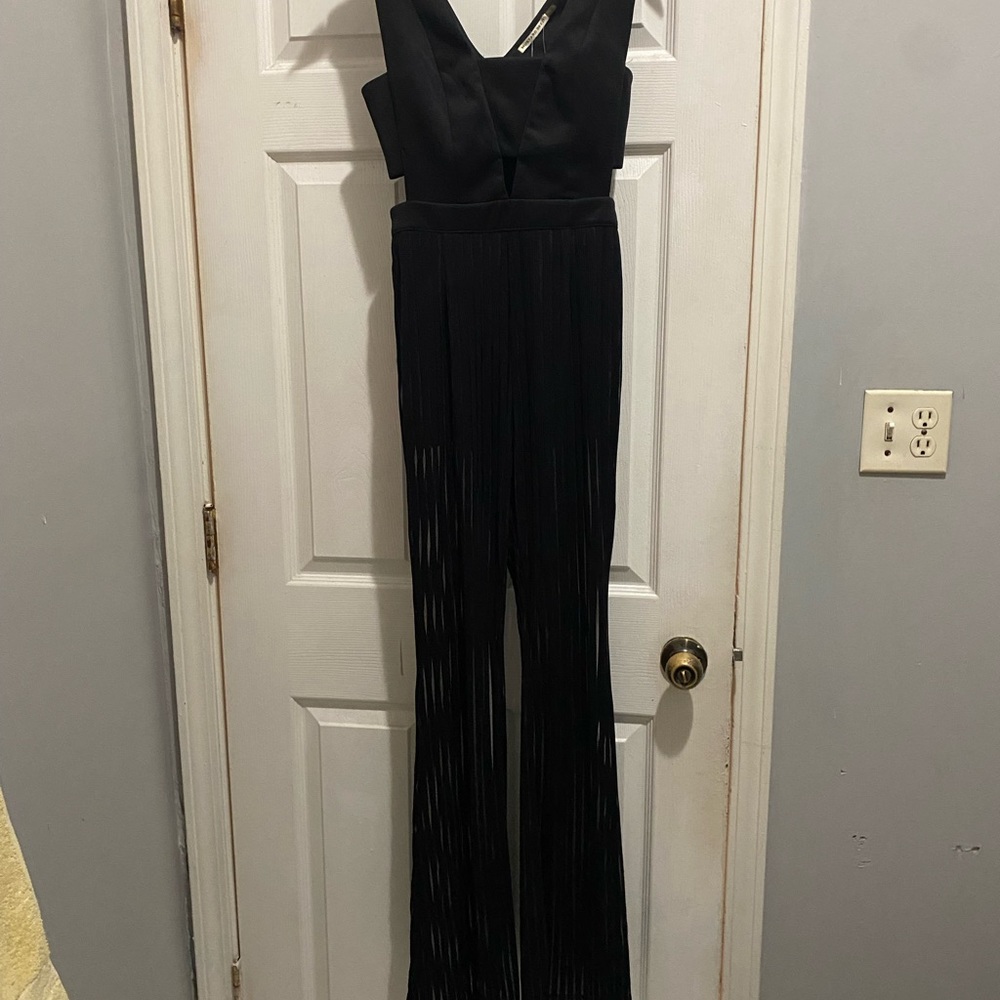 Sleeveless wide leg jumpsuit with side out